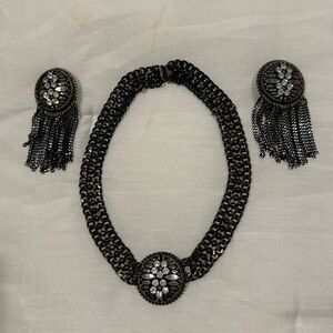 Black necklace with matching clip on earrings